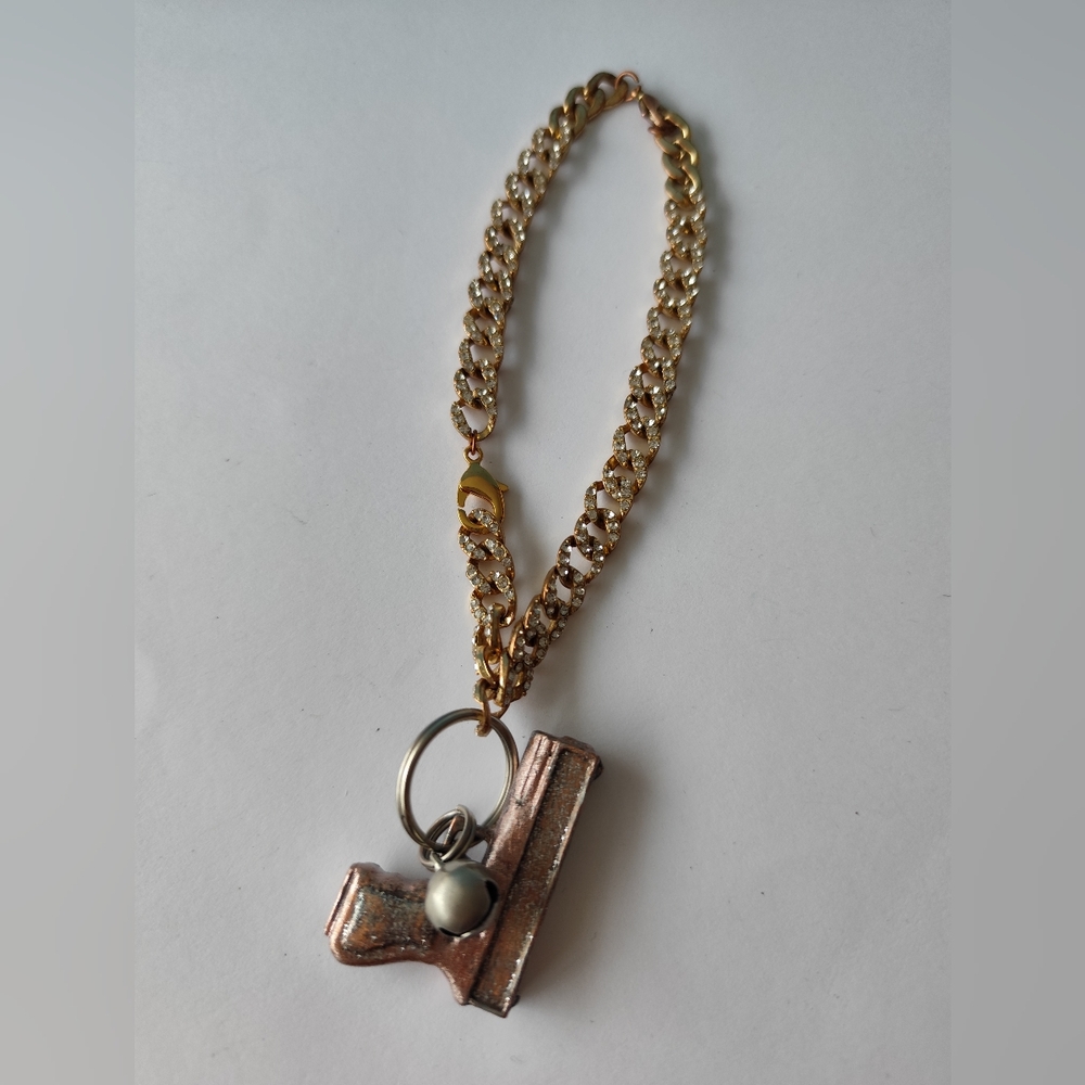 3/$25💙Gold Chain with Gun Pendant